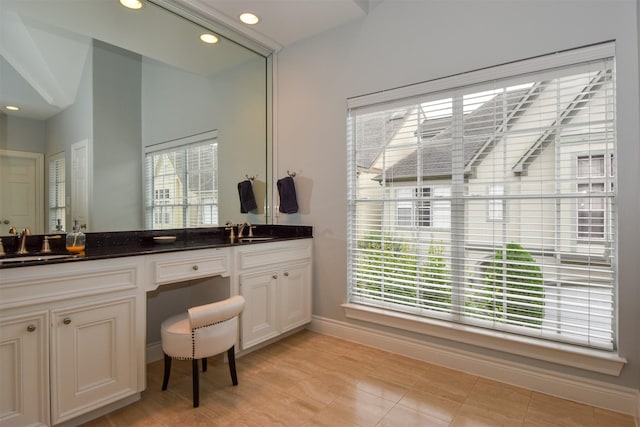 3226 Pemberton Circle Dr, Houston, TX 77025 - bathroom with baseboards, recessed lighting, and double vanity