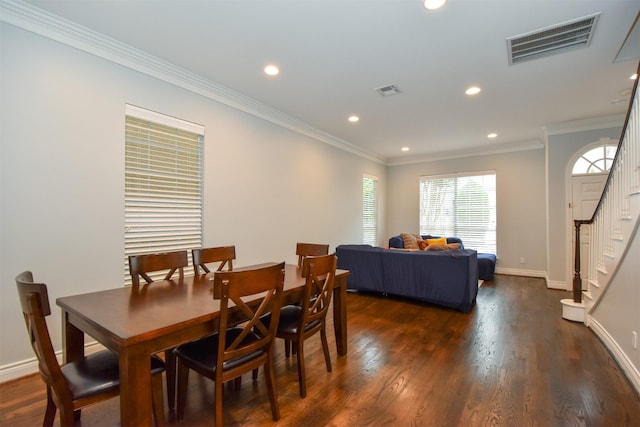 3226 Pemberton Circle Dr, Houston, TX 77025 - dining space with stairway, dark wood finished floors, recessed lighting, crown molding, and baseboards