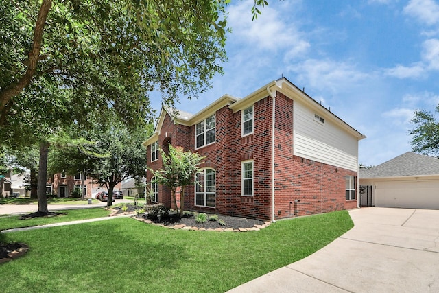 8742 Melting Shadows Ln, Houston, TX 77095 - view of side of home featuring brick siding, a lawn, a garage, and concrete driveway