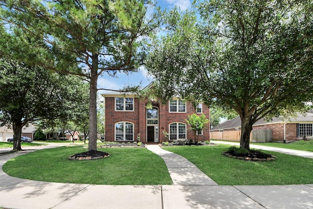 8742 Melting Shadows Ln, Houston, TX 77095 - view of front facade featuring brick siding