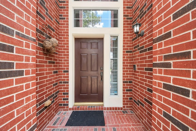 8742 Melting Shadows Ln, Houston, TX 77095 - doorway to property with brick siding