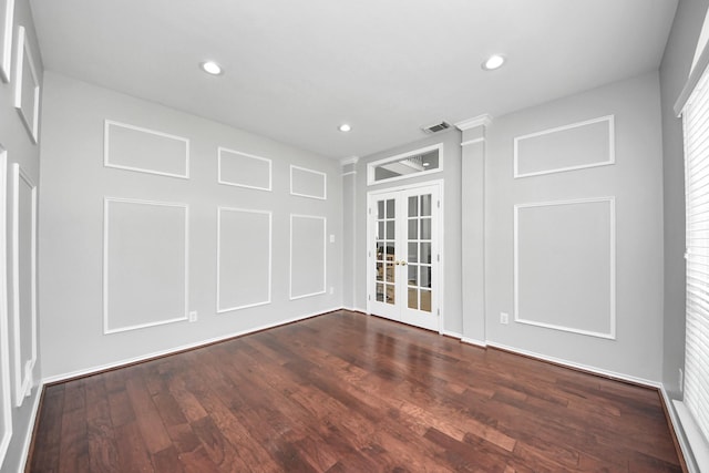 8742 Melting Shadows Ln, Houston, TX 77095 - empty room featuring french doors, dark wood-style floors, and recessed lighting