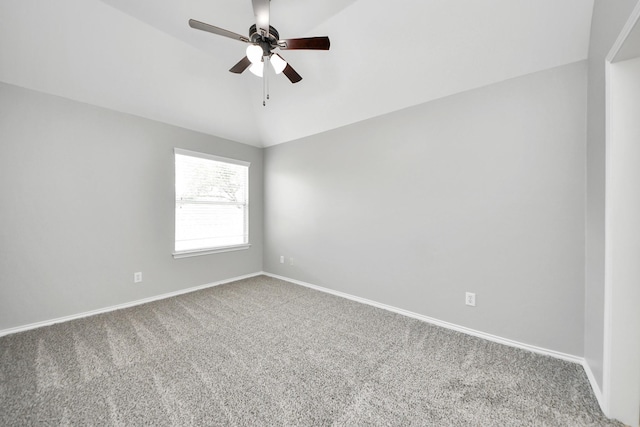 8742 Melting Shadows Ln, Houston, TX 77095 - carpeted empty room featuring vaulted ceiling, a ceiling fan, and baseboards