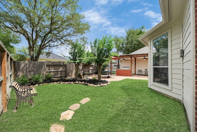 8742 Melting Shadows Ln, Houston, TX 77095 - view of yard with a ceiling fan and a patio area