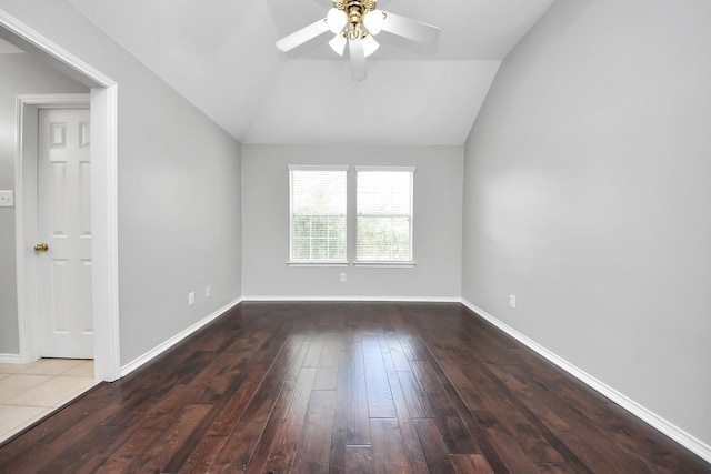 8742 Melting Shadows Ln, Houston, TX 77095 - spare room featuring a ceiling fan, hardwood / wood-style flooring, vaulted ceiling, and baseboards