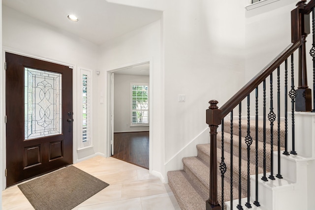 2107 Pearl Bay Ct, Pearland, TX 77584 - entrance foyer featuring stairway, recessed lighting, tile patterned floors, and baseboards