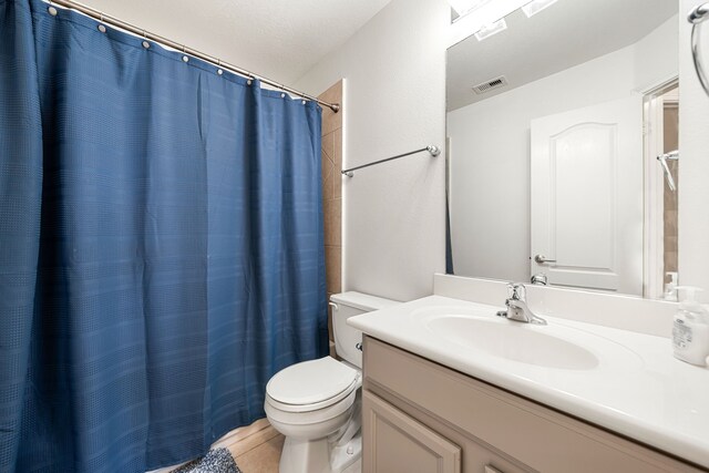 2107 Pearl Bay Ct, Pearland, TX 77584 - full bath featuring toilet, vanity, and a shower with curtain