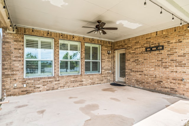 2107 Pearl Bay Ct, Pearland, TX 77584 - view of patio featuring ceiling fan