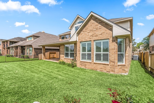 2107 Pearl Bay Ct, Pearland, TX 77584 - rear view of house with brick siding and central AC unit