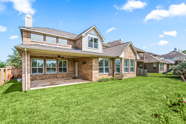 2107 Pearl Bay Ct, Pearland, TX 77584 - rear view of property featuring brick siding, a patio, a chimney, and a shingled roof