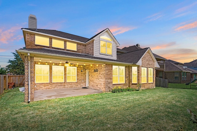 2107 Pearl Bay Ct, Pearland, TX 77584 - rear view of house featuring brick siding, a patio, and a chimney