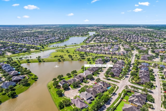 2107 Pearl Bay Ct, Pearland, TX 77584 - aerial overview of property's location with nearby suburban area and a large body of water