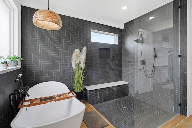 9603 Neon Moon Dr, Needville, TX 77461 - bathroom with a freestanding tub, walk in shower, and recessed lighting