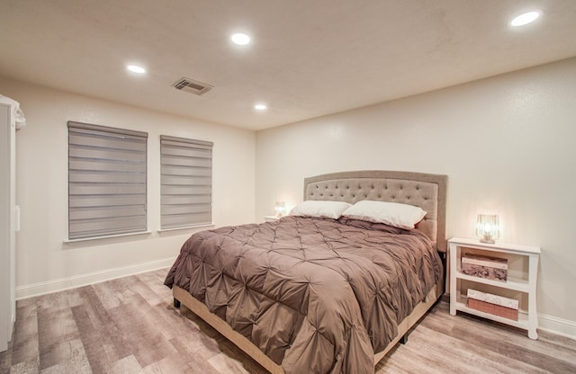 2519 Bradburn Hill Ln, Houston, TX 77014 - bedroom featuring wood finished floors, recessed lighting, and baseboards