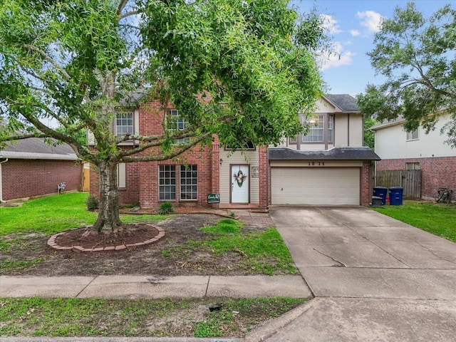 1814 Oak Valley Dr, Kemah, TX 77565 - view of front of house featuring an attached garage, driveway, and brick siding