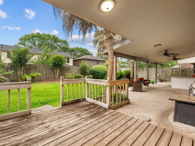 1814 Oak Valley Dr, Kemah, TX 77565 - wooden terrace featuring ceiling fan and a patio area