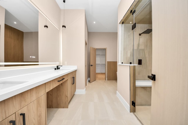 full bath with a stall shower, double vanity, baseboards, tile patterned floors, and recessed lighting