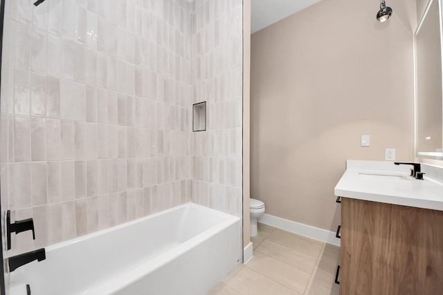 bathroom featuring tile patterned flooring, vanity, toilet, baseboards, and  shower combination