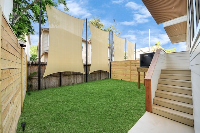view of yard featuring cooling unit