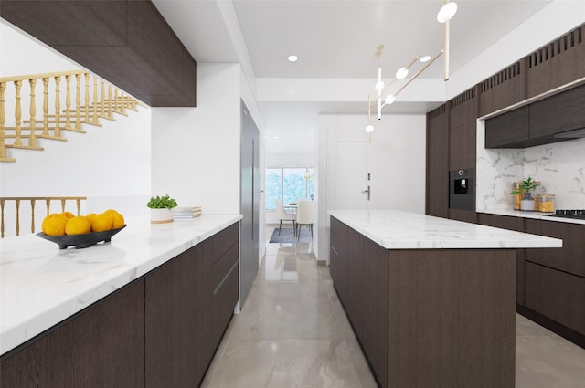 1804 N Memorial Way Unit B, Houston, TX 77007 - kitchen with modern cabinets, a kitchen island, dark brown cabinets, and backsplash