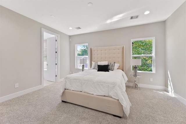 238 Julia St Unit E, Houston, TX 77022 - bedroom featuring carpet flooring, baseboards, and recessed lighting
