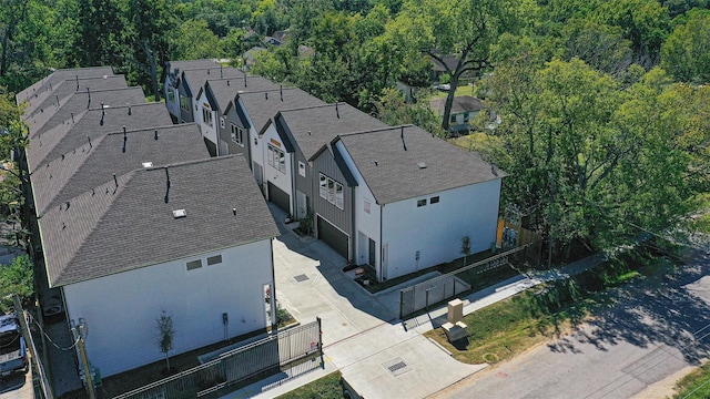 238 Julia St Unit E, Houston, TX 77022 - aerial view of property and surrounding area with a forest