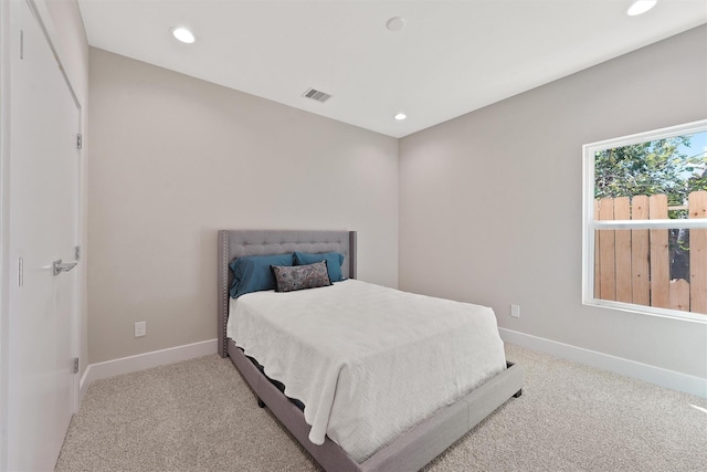 238 Julia St Unit E, Houston, TX 77022 - bedroom featuring carpet floors, recessed lighting, and baseboards