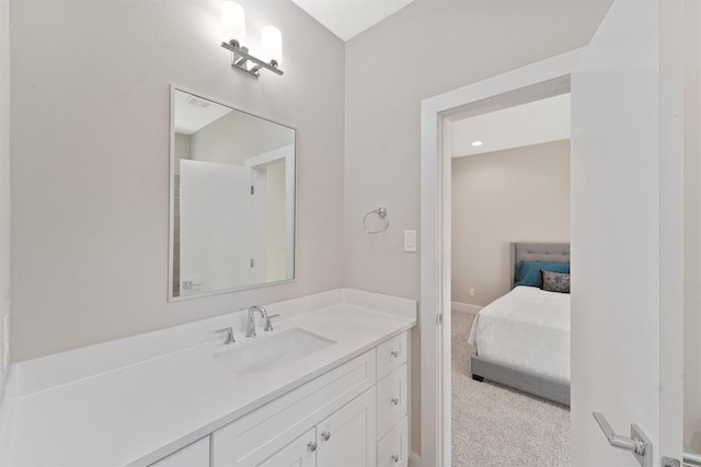 238 Julia St Unit E, Houston, TX 77022 - ensuite bathroom featuring vanity and recessed lighting