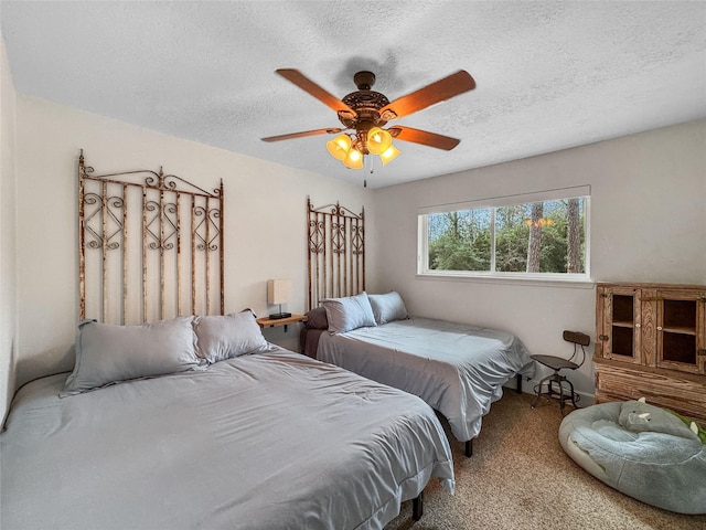 13537 Laramie Trl, Montgomery, TX 77316 - carpeted bedroom featuring a textured ceiling and ceiling fan