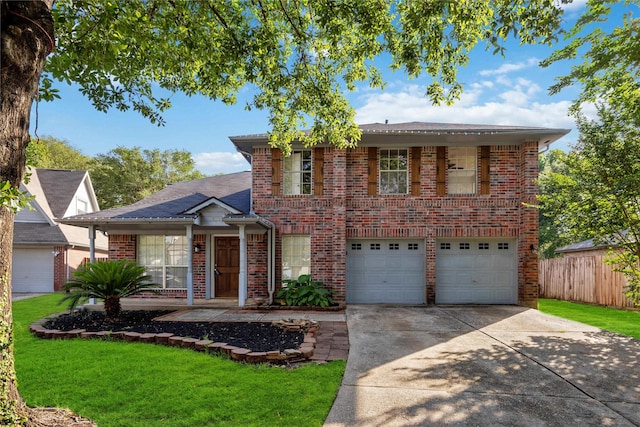 17610 Mill Springs Dr, Spring, TX 77379 - traditional-style home with driveway, brick siding, and a garage