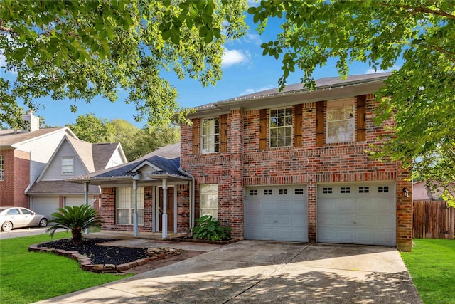 17610 Mill Springs Dr, Spring, TX 77379 - traditional home with driveway, brick siding, an attached garage, and fence