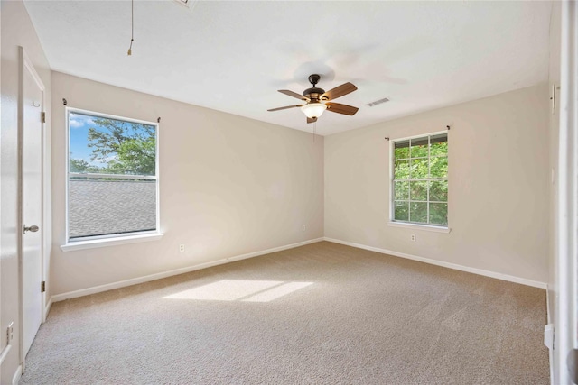 17610 Mill Springs Dr, Spring, TX 77379 - spare room with carpet floors, a ceiling fan, baseboards, and attic access