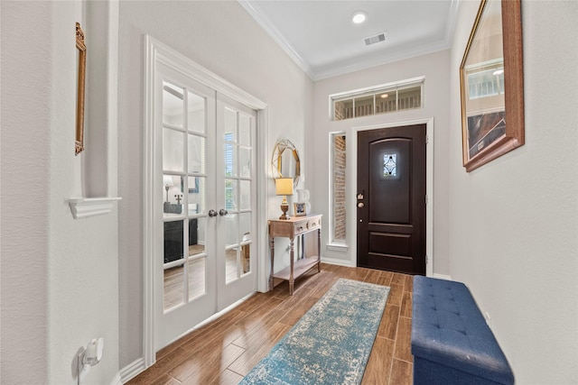 20122 Matador Ridge Dr, Cypress, TX 77433 - entryway with french doors, crown molding, wood finished floors, and baseboards