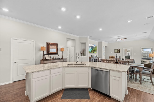20122 Matador Ridge Dr, Cypress, TX 77433 - kitchen featuring stainless steel dishwasher, a sink, a ceiling fan, an island with sink, and wood finished floors