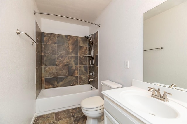 21202 Fire Wind Ct, Spring, TX 77379 - bathroom featuring toilet, vanity,  shower combination, and stone finish flooring