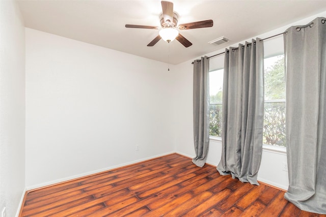 21202 Fire Wind Ct, Spring, TX 77379 - empty room with a ceiling fan, wood finished floors, and baseboards