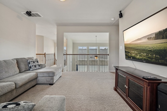 237 Catoti Cay Ct, Conroe, TX 77304 - living area featuring carpet flooring and ceiling fan
