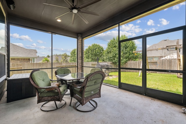 237 Catoti Cay Ct, Conroe, TX 77304 - sunroom / solarium featuring a ceiling fan, outdoor dining space, and plenty of natural light