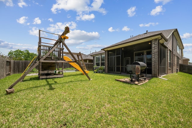 237 Catoti Cay Ct, Conroe, TX 77304 - view of jungle gym featuring a sunroom