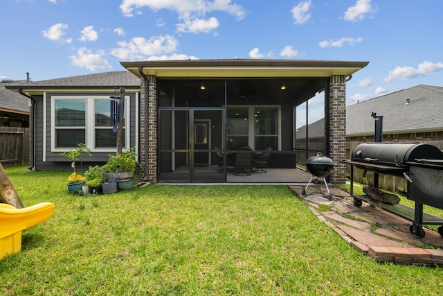237 Catoti Cay Ct, Conroe, TX 77304 - rear view of property with a sunroom and a patio