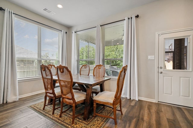 237 Catoti Cay Ct, Conroe, TX 77304 - dining area featuring wood finished floors, baseboards, plenty of natural light, and recessed lighting