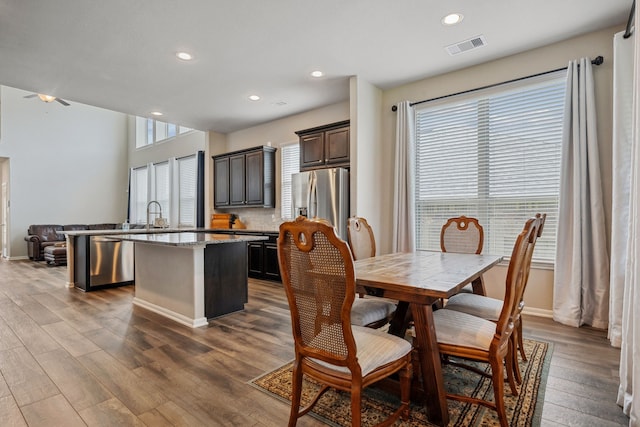 237 Catoti Cay Ct, Conroe, TX 77304 - dining space with dark wood-style floors, recessed lighting, ceiling fan, and baseboards