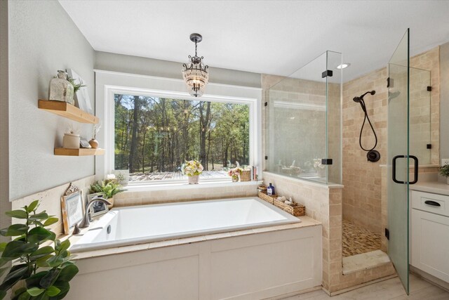 41103 Mill Creek Rd, Magnolia, TX 77354 - bathroom with a bath and a shower stall