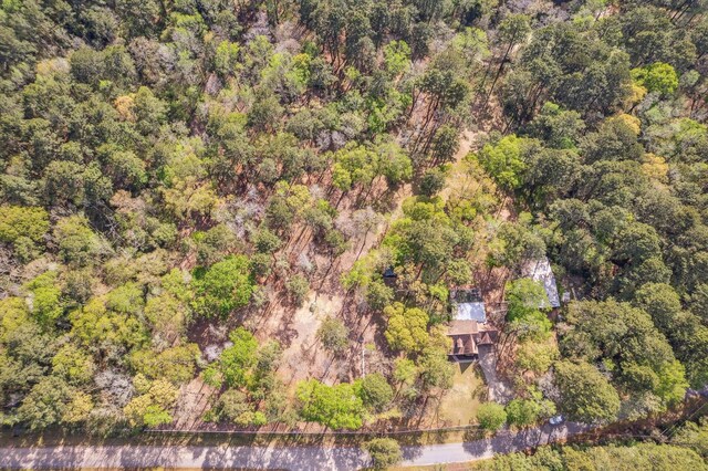 41103 Mill Creek Rd, Magnolia, TX 77354 - aerial view of property and surrounding area featuring a heavily wooded area
