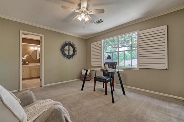 office area featuring crown molding, a ceiling fan, carpet flooring, and baseboards