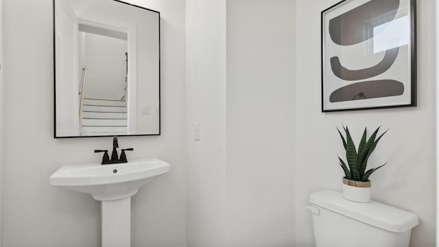 723 Marcella St Unit E, Houston, TX 77091 - half bathroom featuring toilet