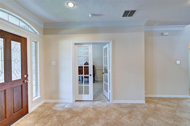 14022 Ashland Landing Dr, Cypress, TX 77429 - entryway with french doors, ornamental molding, and baseboards