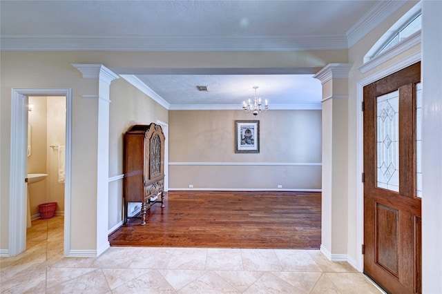 14022 Ashland Landing Dr, Cypress, TX 77429 - entrance foyer with a chandelier, crown molding, and baseboards