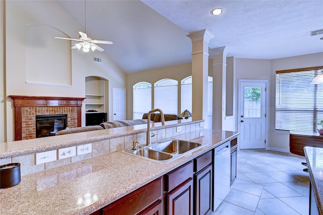 14022 Ashland Landing Dr, Cypress, TX 77429 - kitchen featuring a sink, vaulted ceiling, open floor plan, white dishwasher, and ceiling fan
