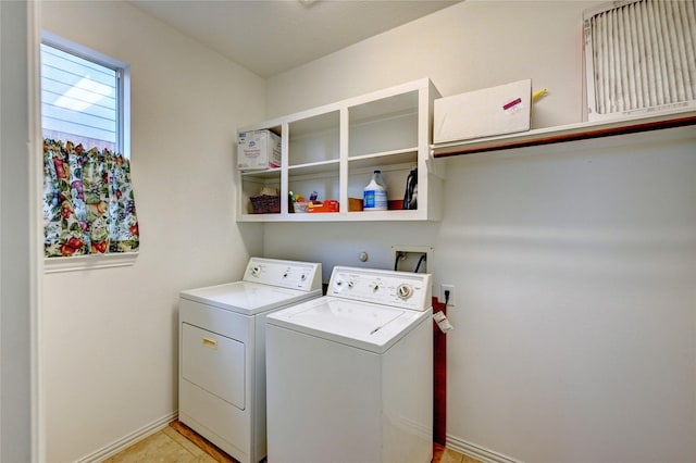 14022 Ashland Landing Dr, Cypress, TX 77429 - washroom featuring independent washer and dryer and baseboards